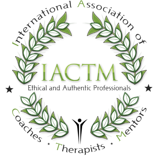 A green wreath with the letters iactm in it.